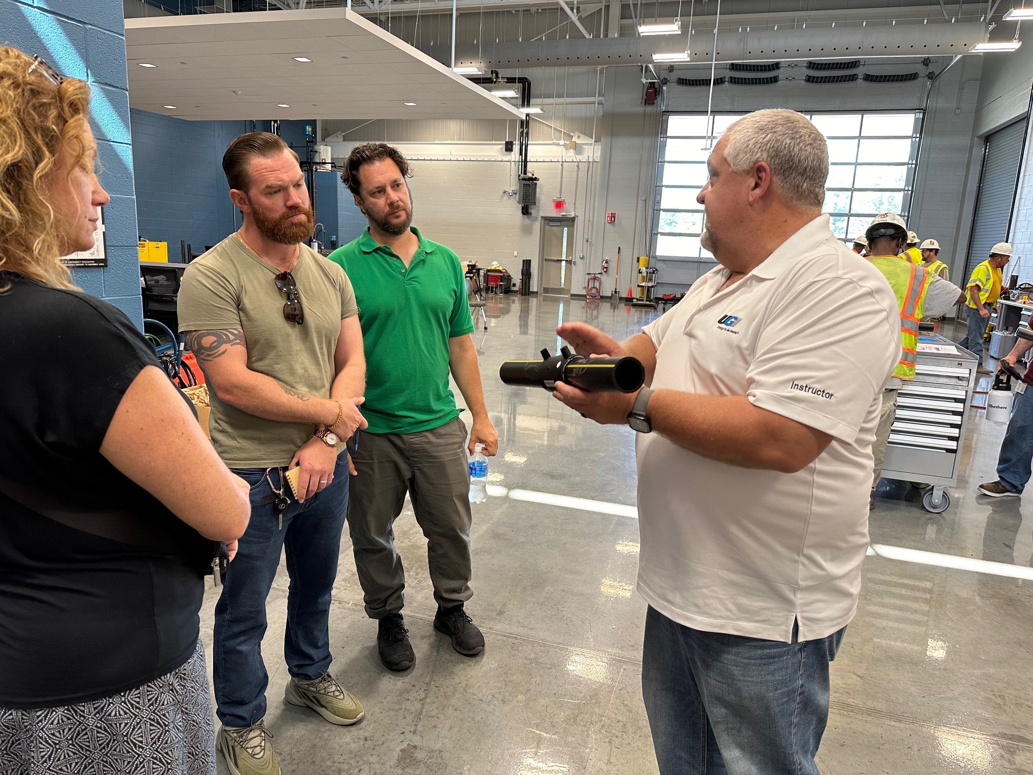 A UGI employee teaches local teachers about equipment at UGI's Learning Center.
