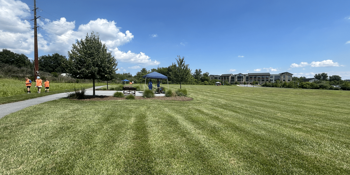 Students participating in a scavenger hunt on the grounds of UGI's Denver office