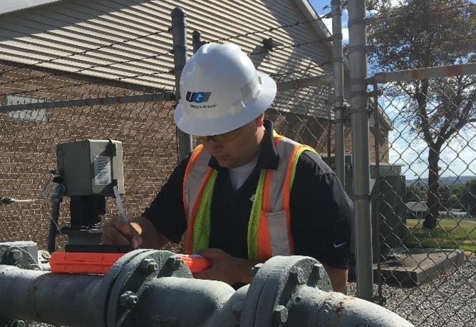 Stephen reviewing gas pipe