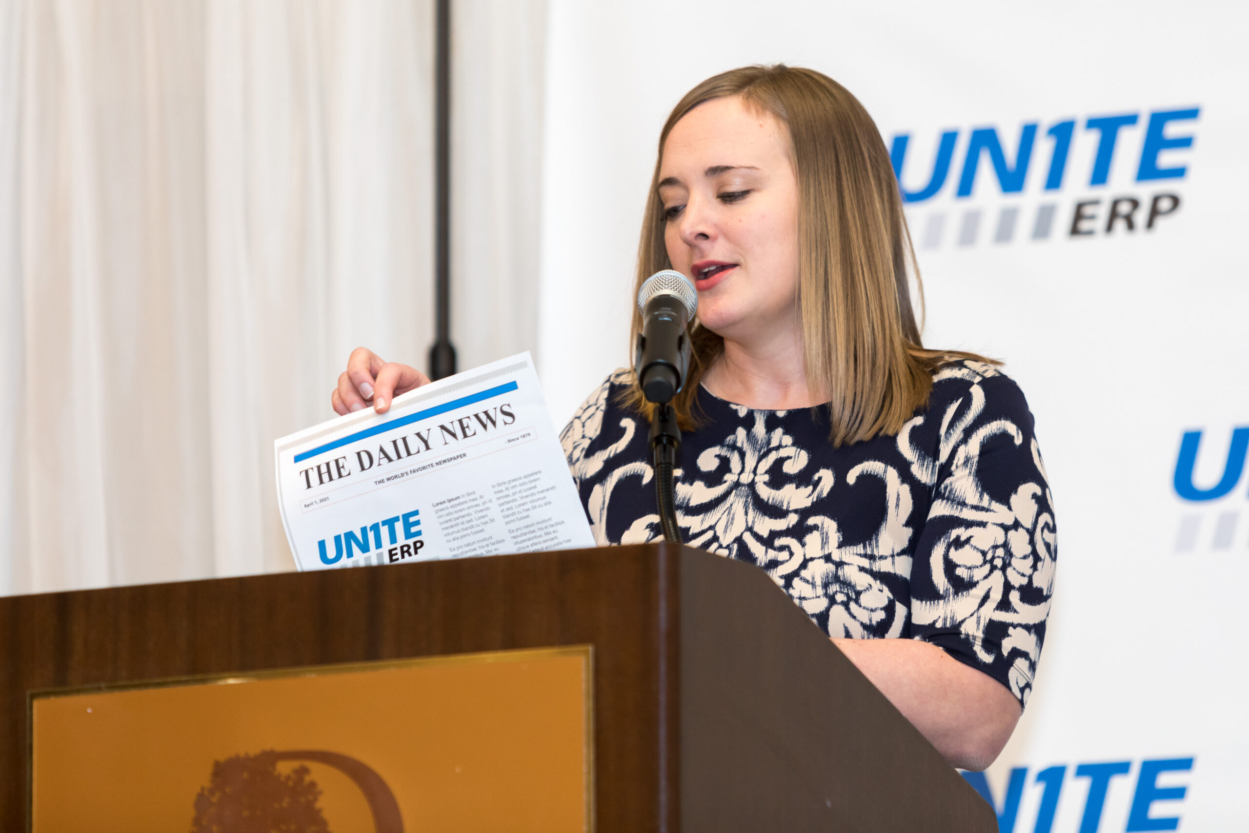 Ashley speaking at an event